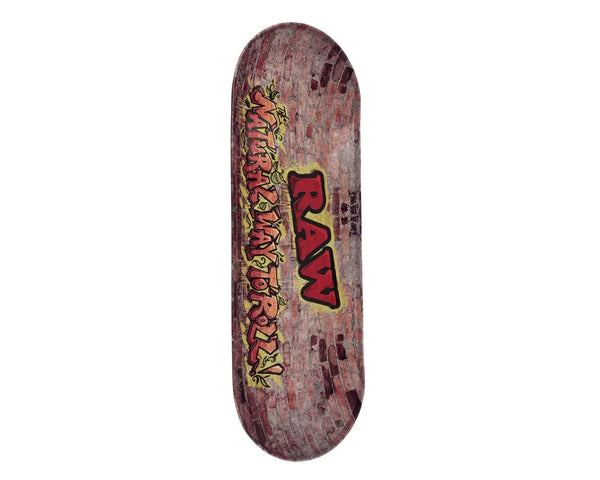 Plateau fumeur RAW design mur de briques avec lettrage graffiti « RAW Natural Way to Roll », en format allongé type skate pour accessoires CBD à Metz
