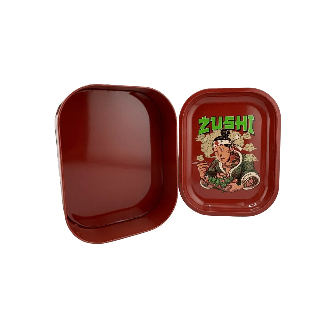 Boîte de rangement en métal Zushi rouge ouverte avec couvercle décoré posé à côté, design japonais cartoon, pour accessoires CBD à Metz