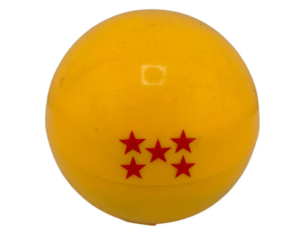 Grinder en forme de boule style Dragon Ball orange avec cinq étoiles rouges, design rond inspiré manga, idéal pour accessoires CBD à Metz
