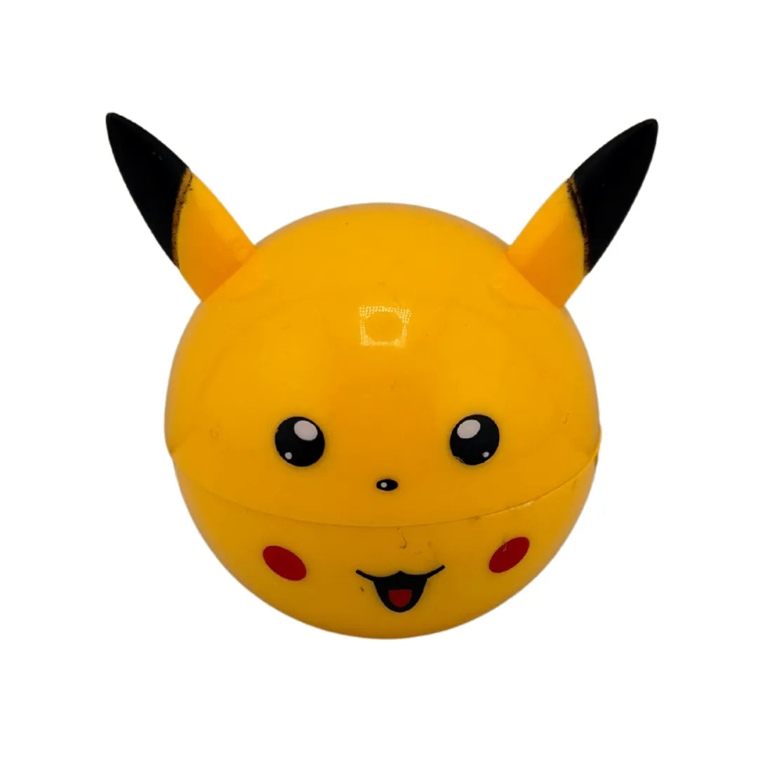 Grinder rond jaune style Pikachu avec oreilles noires et visage cartoon, modèle 2 parties aimantées, idéal pour accessoires CBD à Metz
