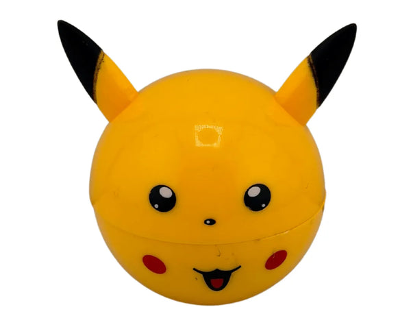 Grinder rond jaune style Pikachu avec oreilles noires et visage cartoon, modèle 2 parties aimantées, idéal pour accessoires CBD à Metz
