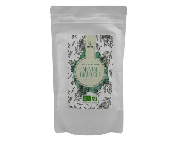 Sachet de thé vert bio au chanvre Menthe Lavande POP CBD, doypack blanc avec motifs botaniques violets et certification agriculture biologique
